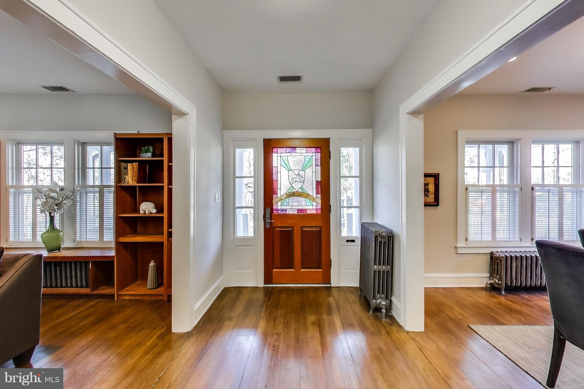 7412 Ridgewood Avenue Chevy Chase, MD 20815 - Photo 3 of 30 Bright Foyer & Stunning Stained Glass Door