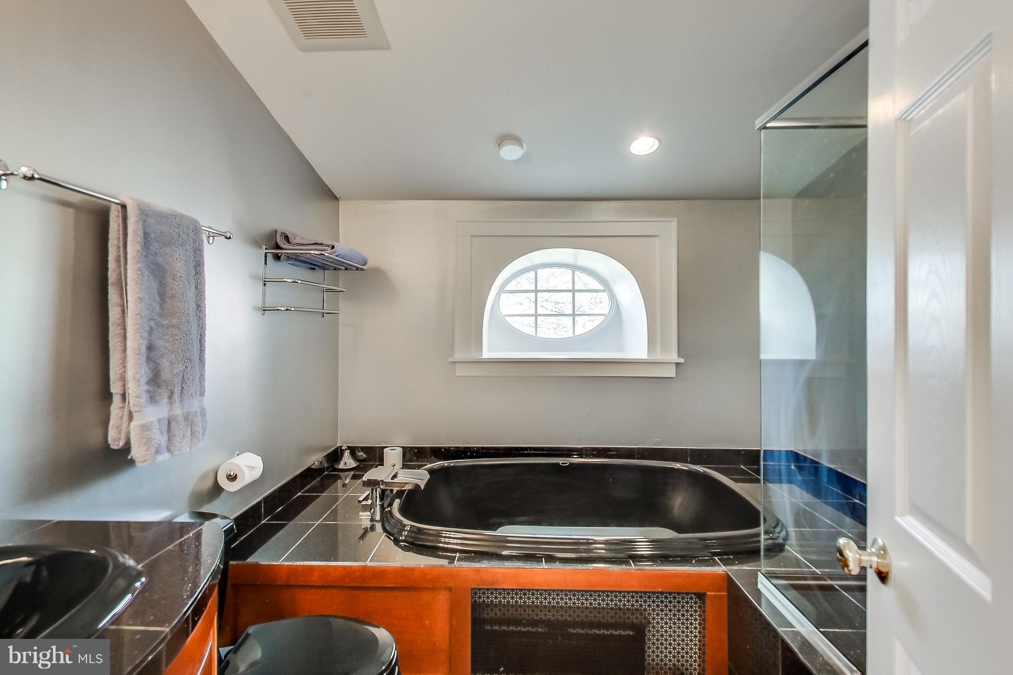 7412 Ridgewood Avenue Chevy Chase, MD 20815 - Photo 21 of 30 Full Bathroom on Upper Level