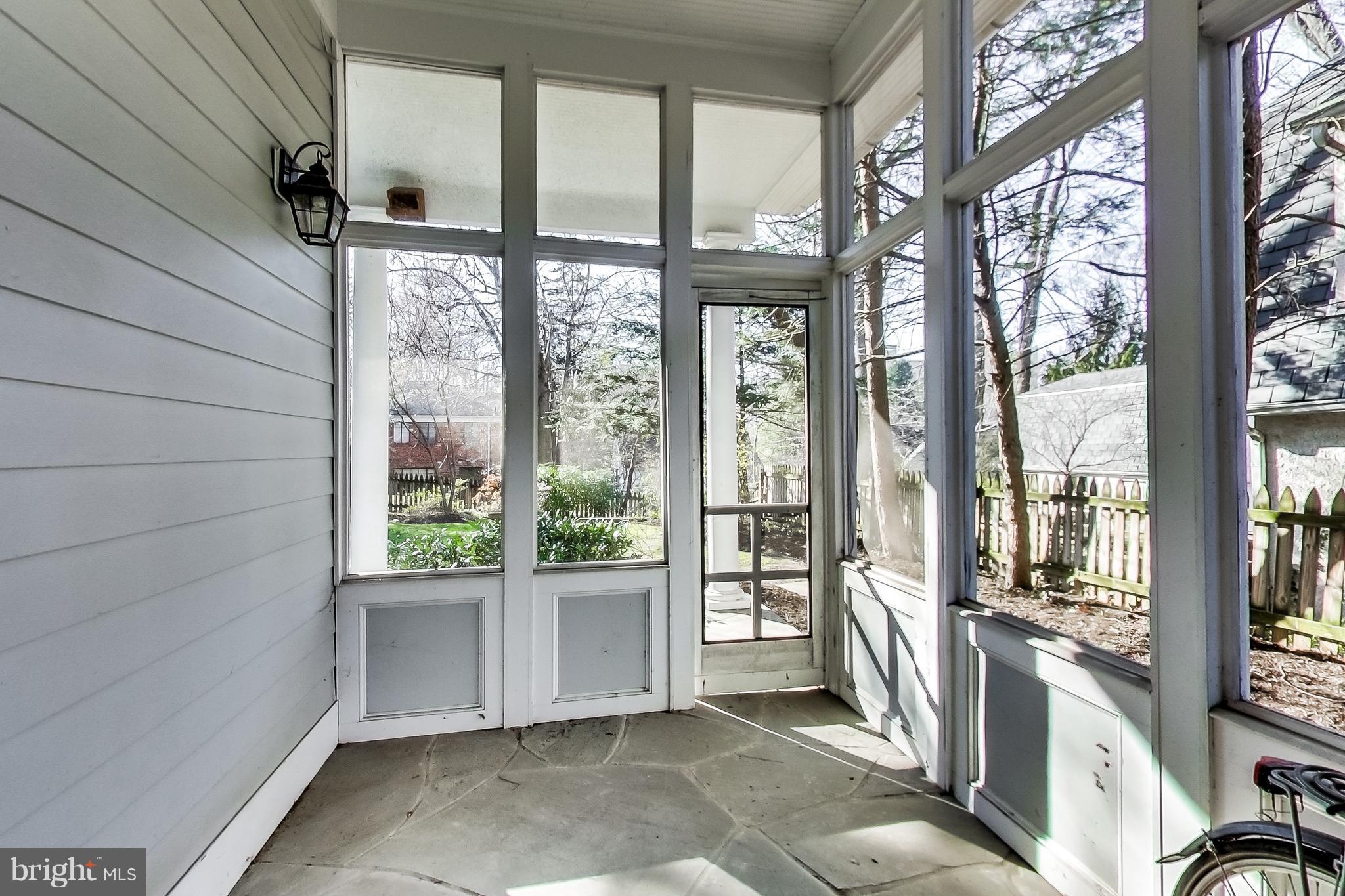 7412 Ridgewood Avenue Chevy Chase, MD 20815 - Photo 25 of 30 Side Screened Porch