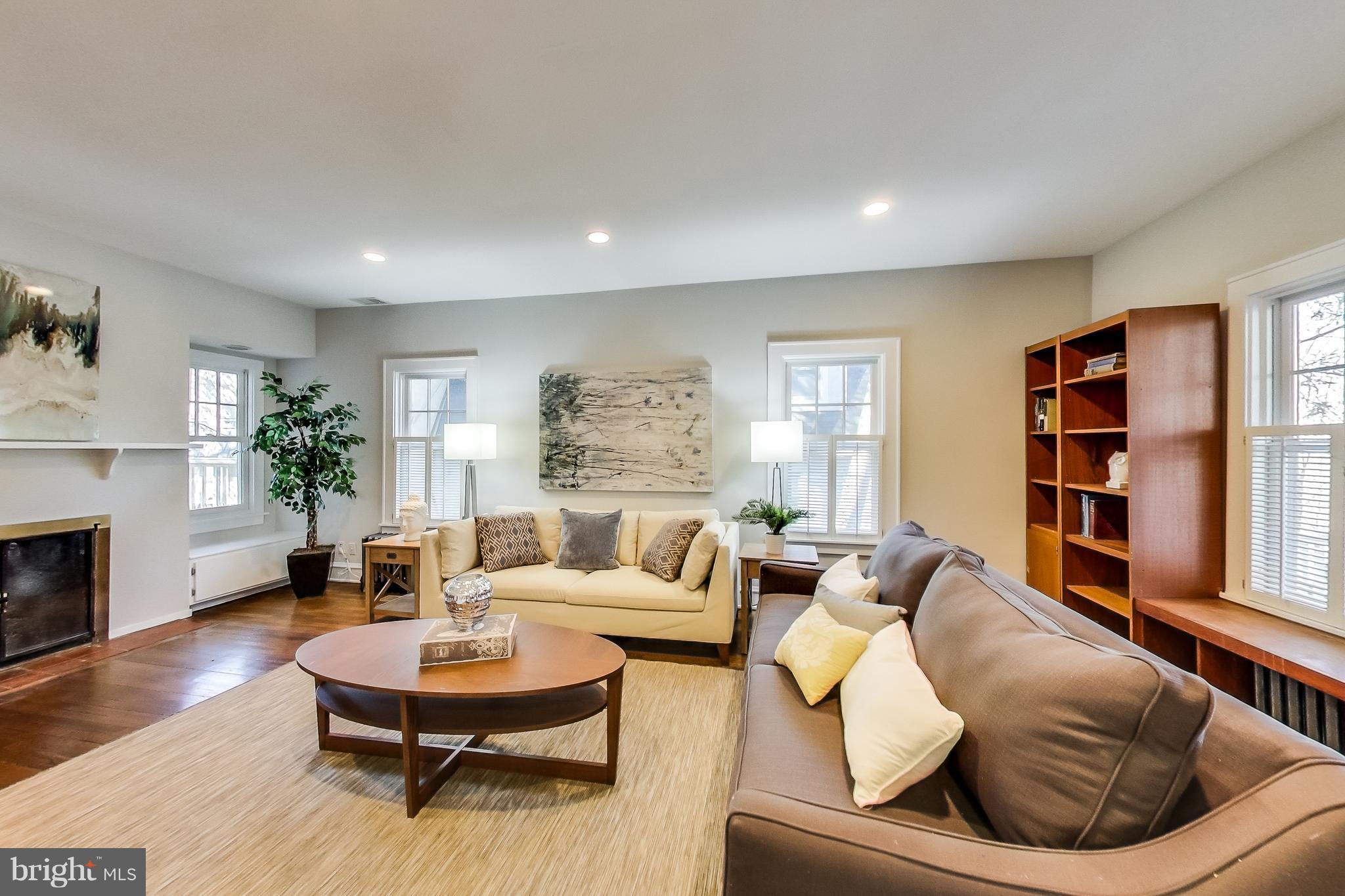 7412 Ridgewood Avenue Chevy Chase, MD 20815 - Photo 4 of 30 Bright & Spacious Living Room w/ Fireplace