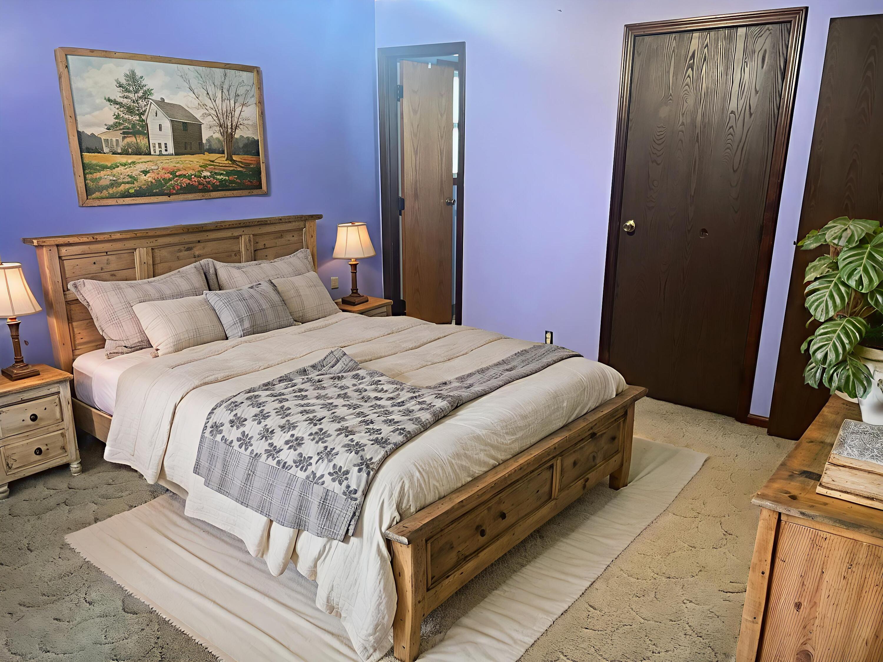 12243 Duttlinger Lane Wheatfield, IN 46392 - Photo 16 of 27 a bedroom with bed and cupboard