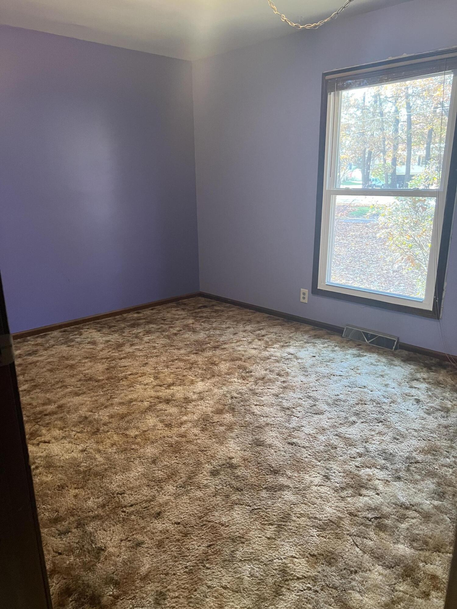 12243 Duttlinger Lane Wheatfield, IN 46392 - Photo 19 of 27 a view of empty room with window