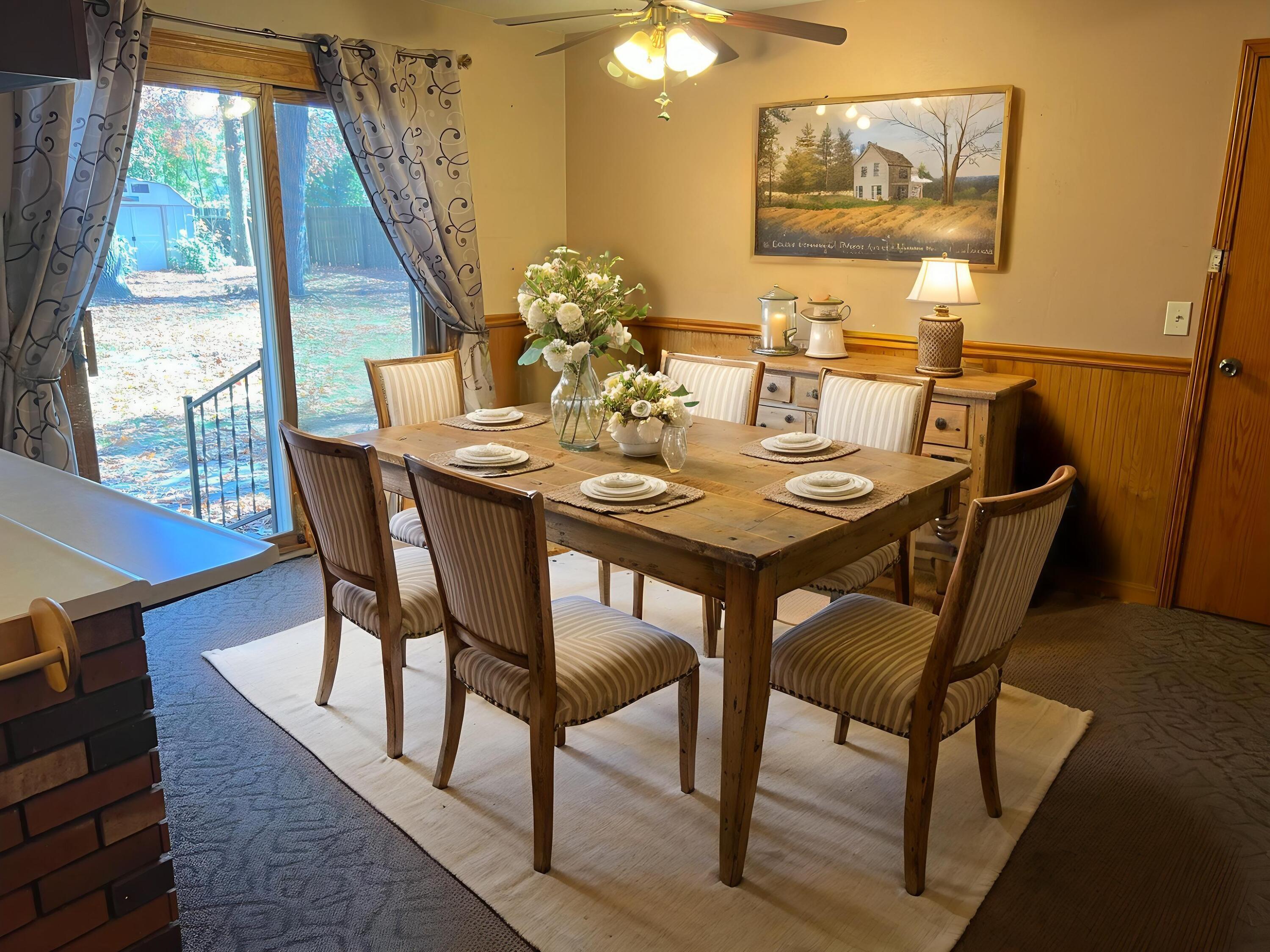 12243 Duttlinger Lane Wheatfield, IN 46392 - Photo 3 of 27 a dining room with furniture and wooden floor
