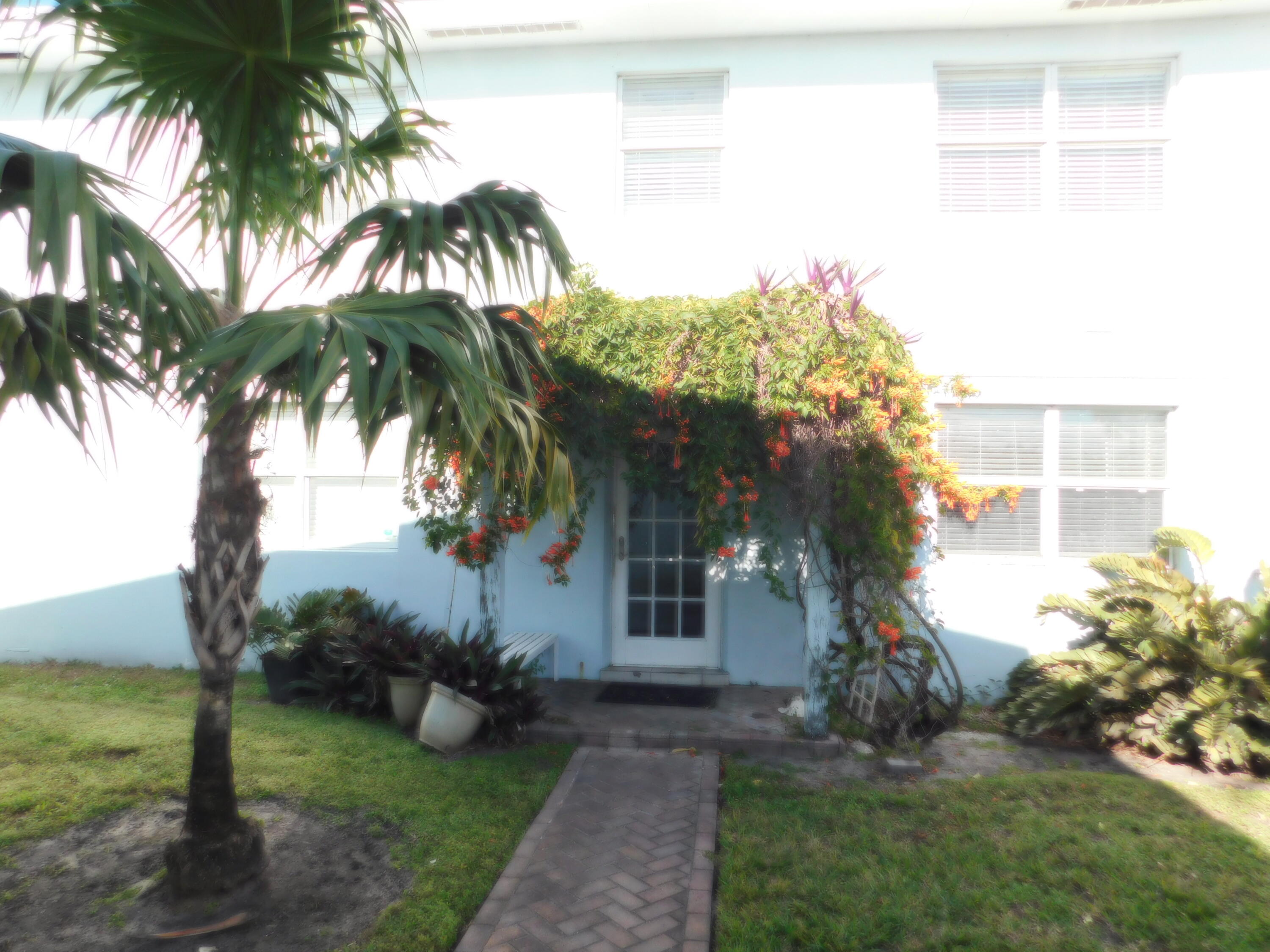 741 Hummingbird Way, Unit 5 North Palm Beach, FL 33408 - Photo 2 of 19 Entrance