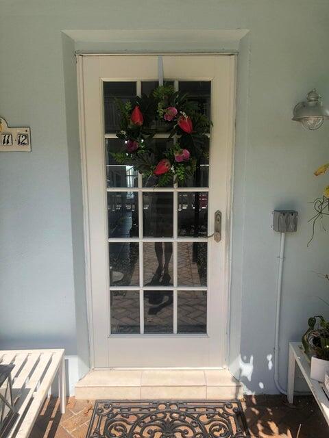 741 Hummingbird Way, Unit 5 North Palm Beach, FL 33408 - Photo 3 of 19 Entrance