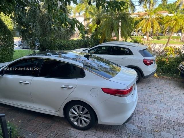 2870 Pine Tree Drive, Unit 2 Miami Beach, FL 33140 - Photo 36 of 36 a front view of a house with parking space
