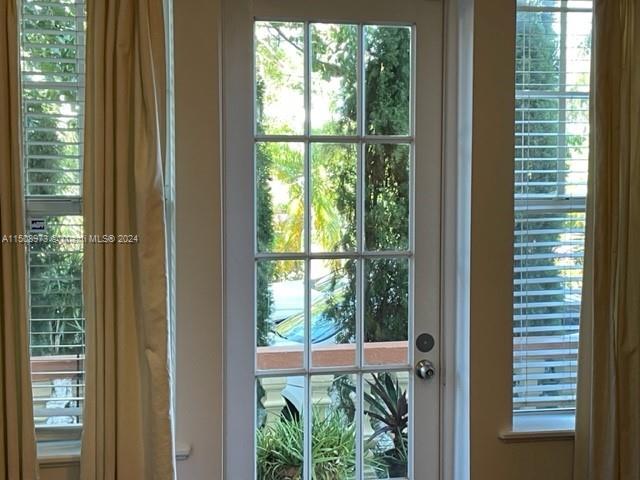 2870 Pine Tree Drive, Unit 2 Miami Beach, FL 33140 - Photo 4 of 36 a view of a room that has a large window