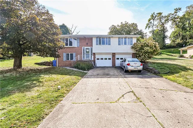 a house view with a garden space