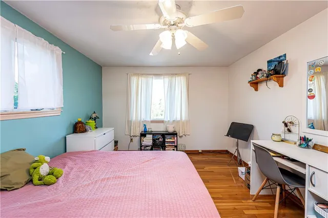 a bedroom with a bed and a table