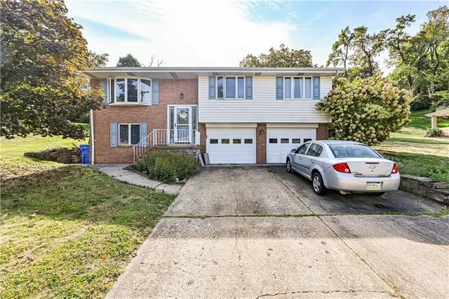 a car parked in front of a house