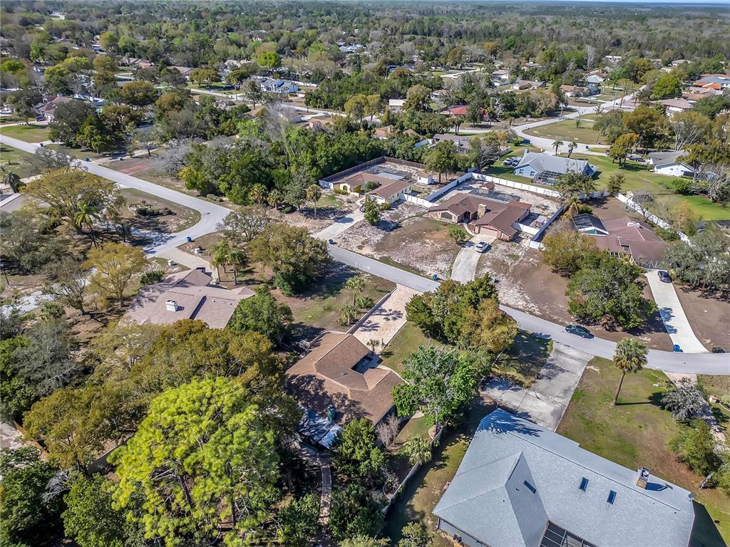 8431 Delaware Drive Weeki Wachee, FL 34607 - Photo 61 of 64 an aerial view of residential houses with outdoor space