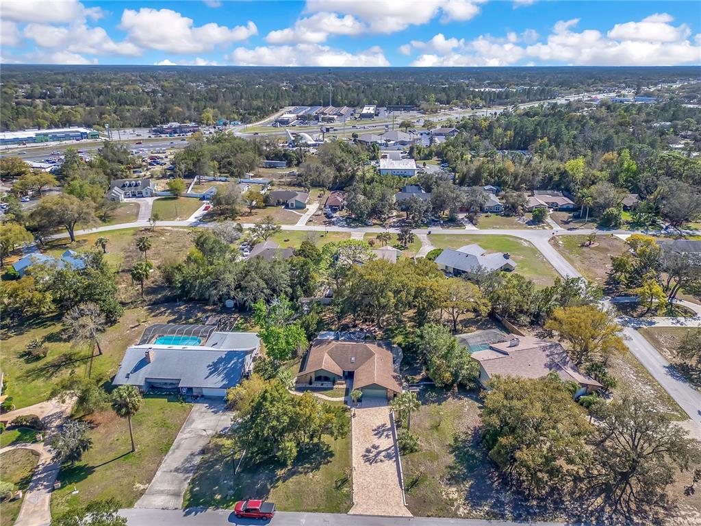 8431 Delaware Drive Weeki Wachee, FL 34607 - Photo 62 of 64 an aerial view of residential houses with outdoor space and river