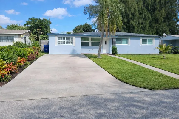 front view of a house and a yard