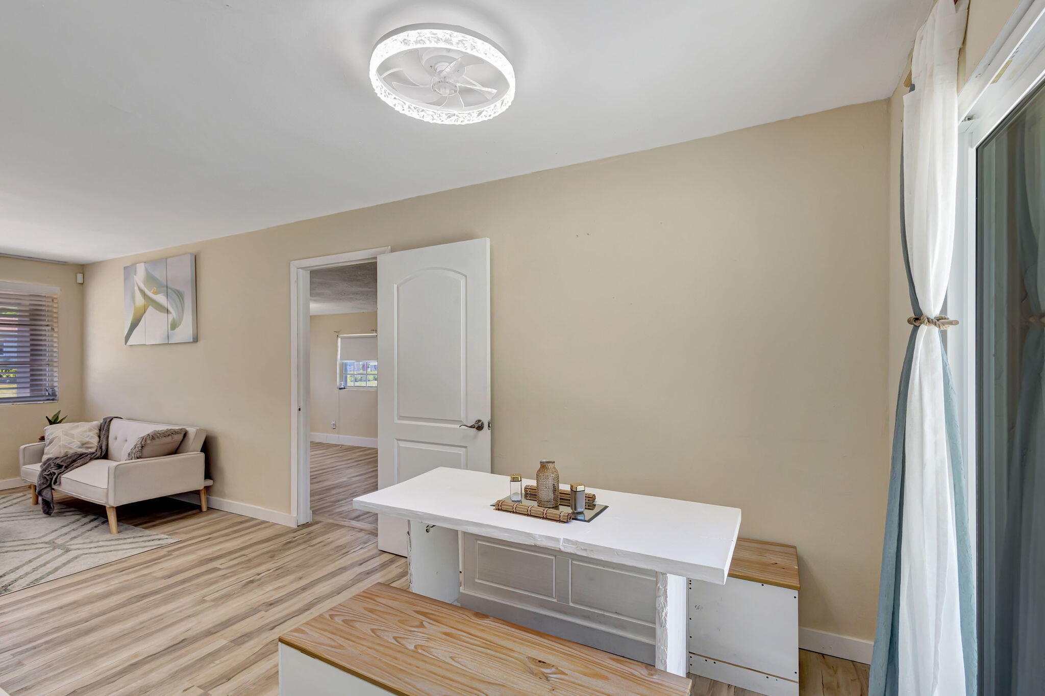 140 West 31st Court Riviera Beach, FL 33404 - Photo 13 of 43 a view of a bedroom with a bed and toys