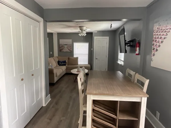 a view of a livingroom with furniture and window