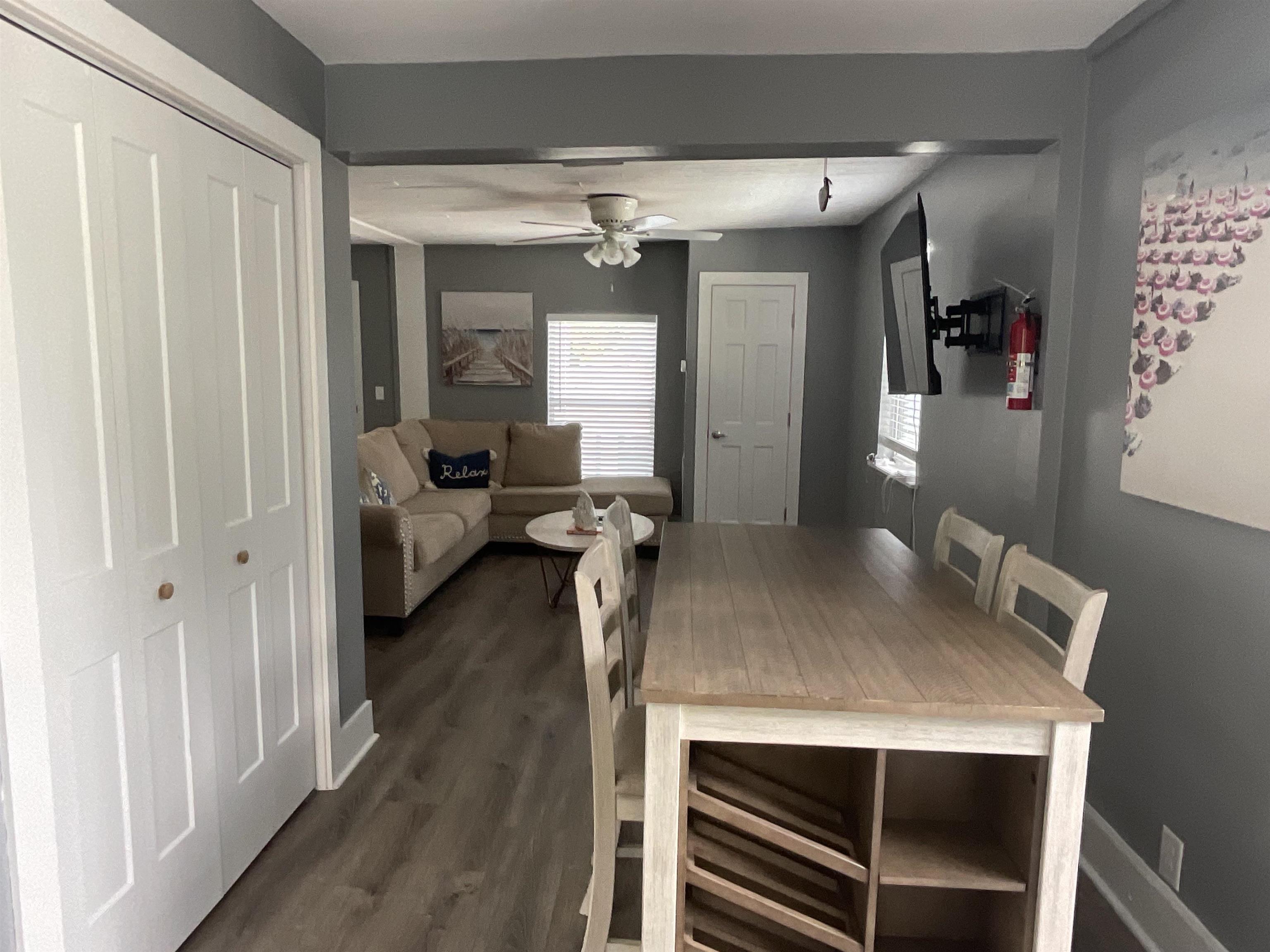 93 Keith Street, Unit B St. Augustine, FL 32084 - Photo 13 of 14 a view of a livingroom with furniture and window