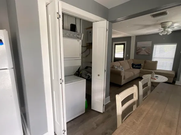 a room with furniture and a hallway