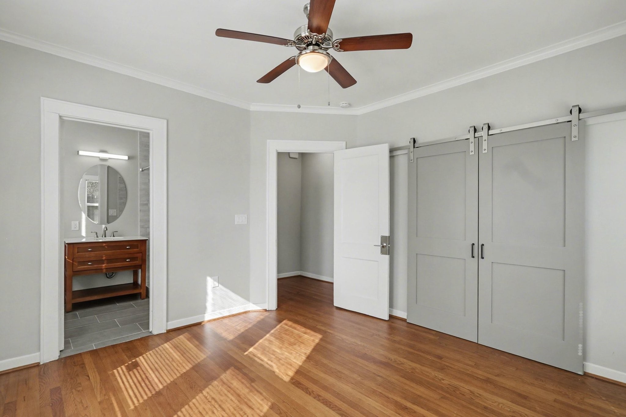 1901 Lexington Street Houston, TX 77098 - Photo 20 of 32 a view of livingroom with hardwood floor and a ceiling fan