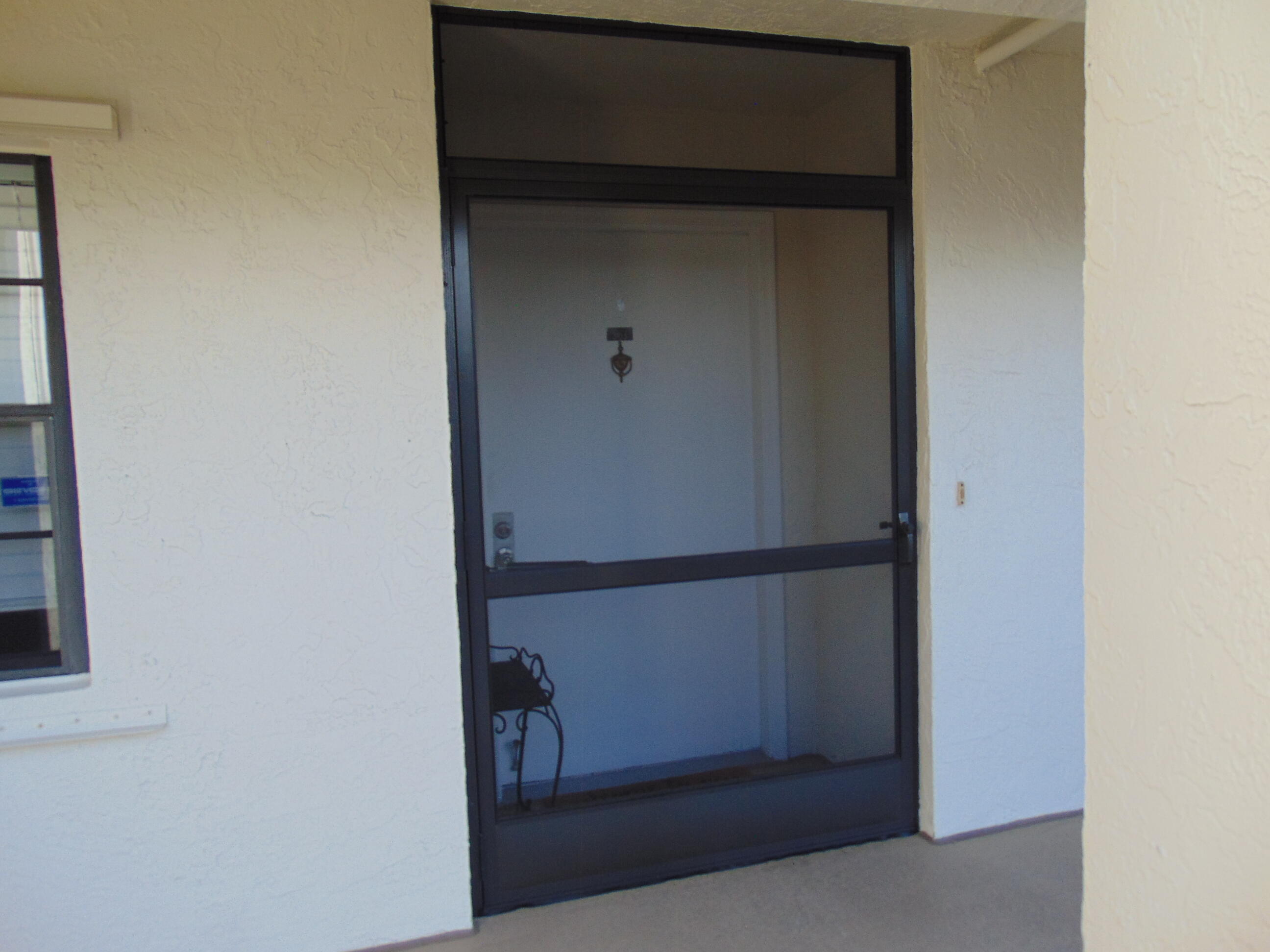 9220 Southwest 14th Street, Unit 3103 Boca Raton, FL 33428 - Photo 7 of 58 BIG WIDE FRONT DOOR