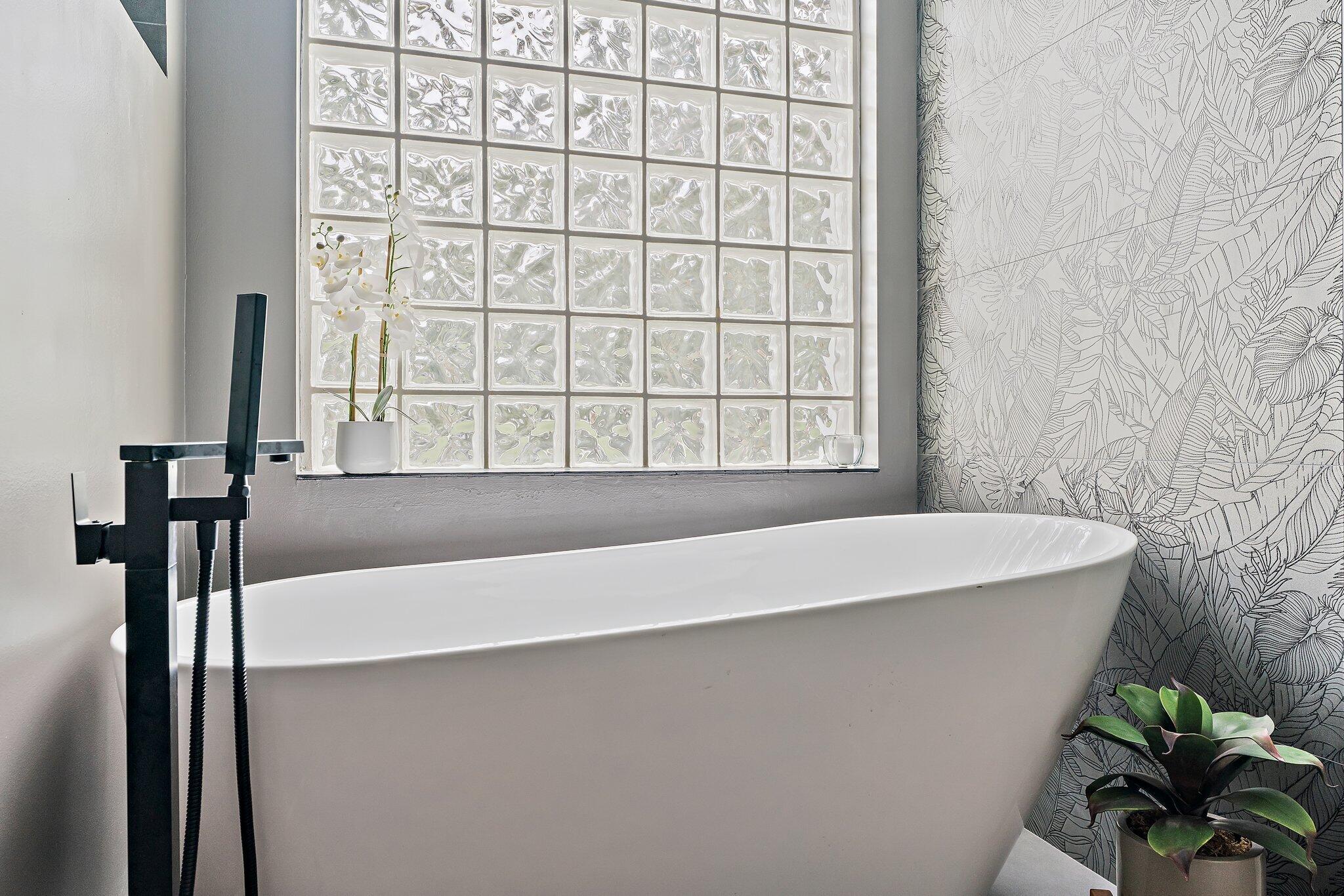 18263 River Oaks Drive Jupiter, FL 33458 - Photo 40 of 49 a close up of a wall with a potted plant