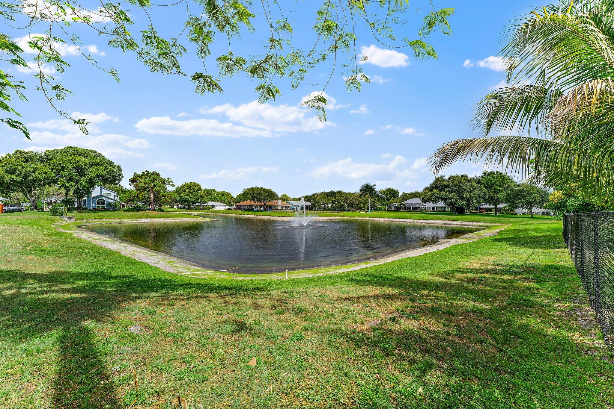 18263 River Oaks Drive Jupiter, FL 33458 - Photo 48 of 49 a view of lake with houses