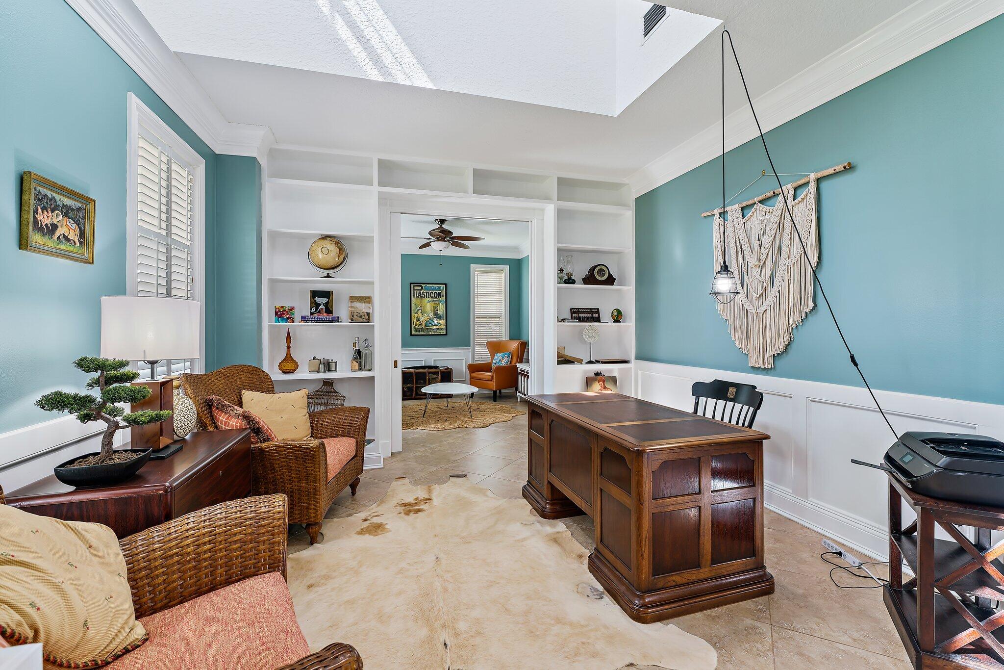 18263 River Oaks Drive Jupiter, FL 33458 - Photo 9 of 49 a living room with furniture window and a table