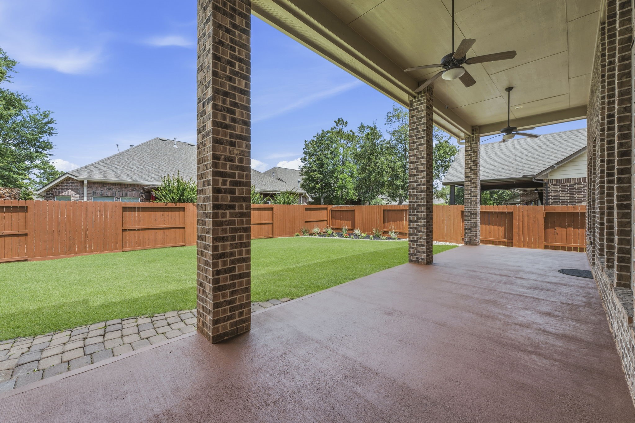 25210 Gaddis Oaks Drive Spring, TX 77389 - Photo 40 of 50 a view of a backyard with a garden