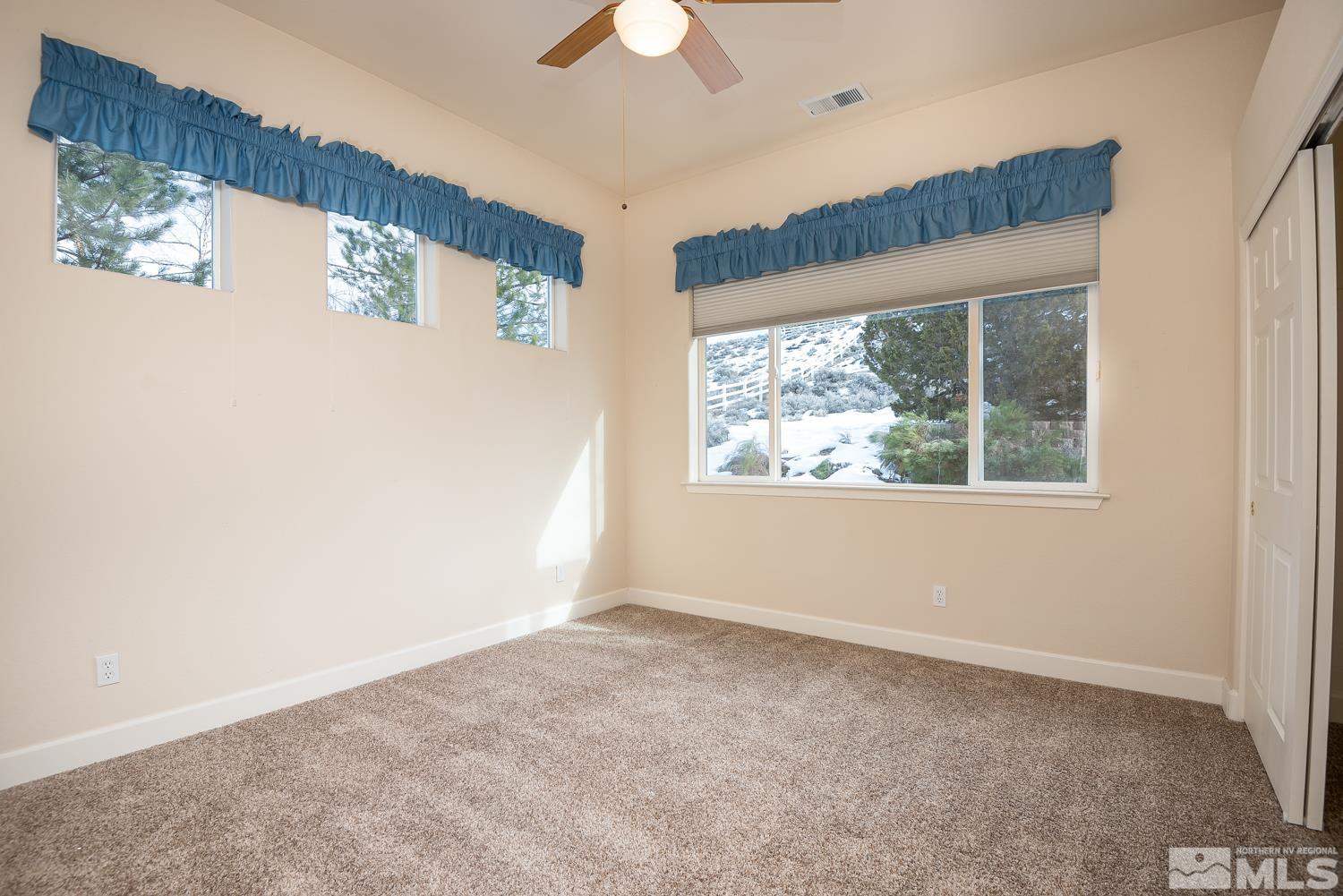 2647 Skyline Drive Minden, NV 89423 - Photo 19 of 39 an empty room with a window
