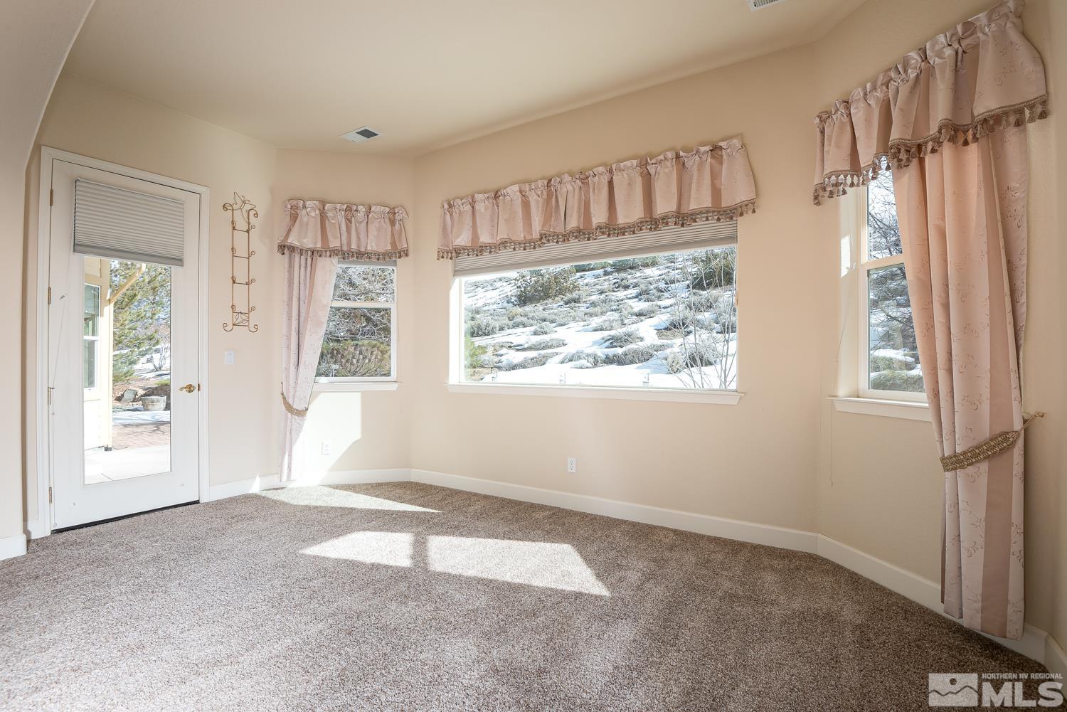 2647 Skyline Drive Minden, NV 89423 - Photo 22 of 39 a view of an empty room with a window