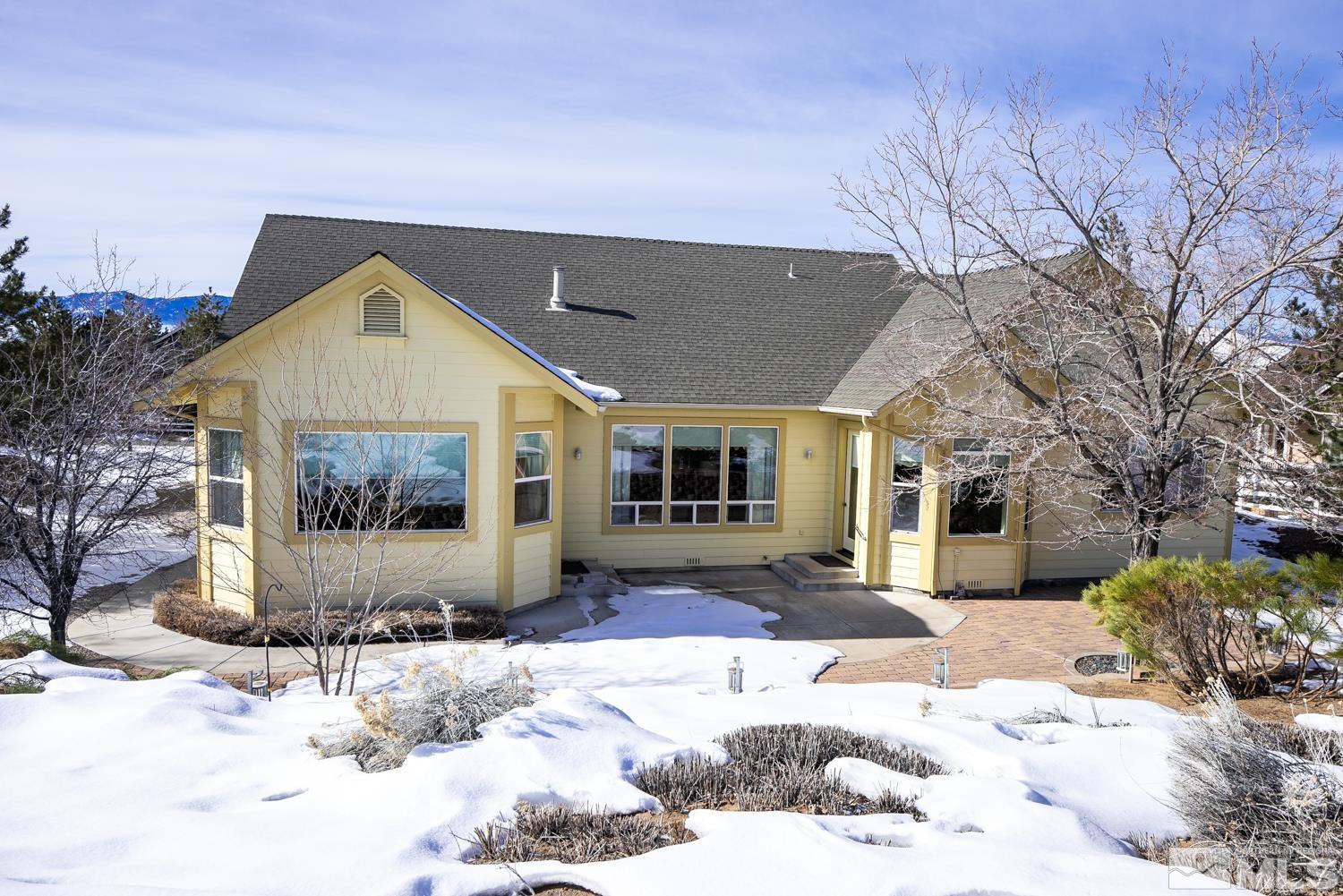 2647 Skyline Drive Minden, NV 89423 - Photo 35 of 39 a view of a house with a yard covered in snow