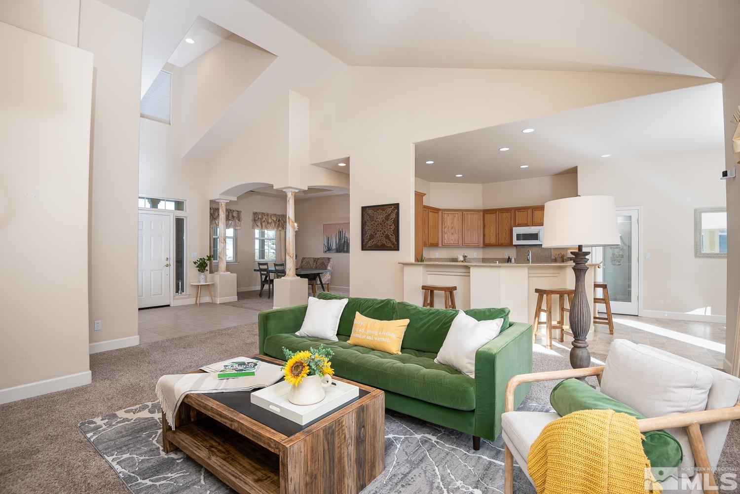 2647 Skyline Drive Minden, NV 89423 - Photo 6 of 39 a living room with furniture kitchen view and a chandelier