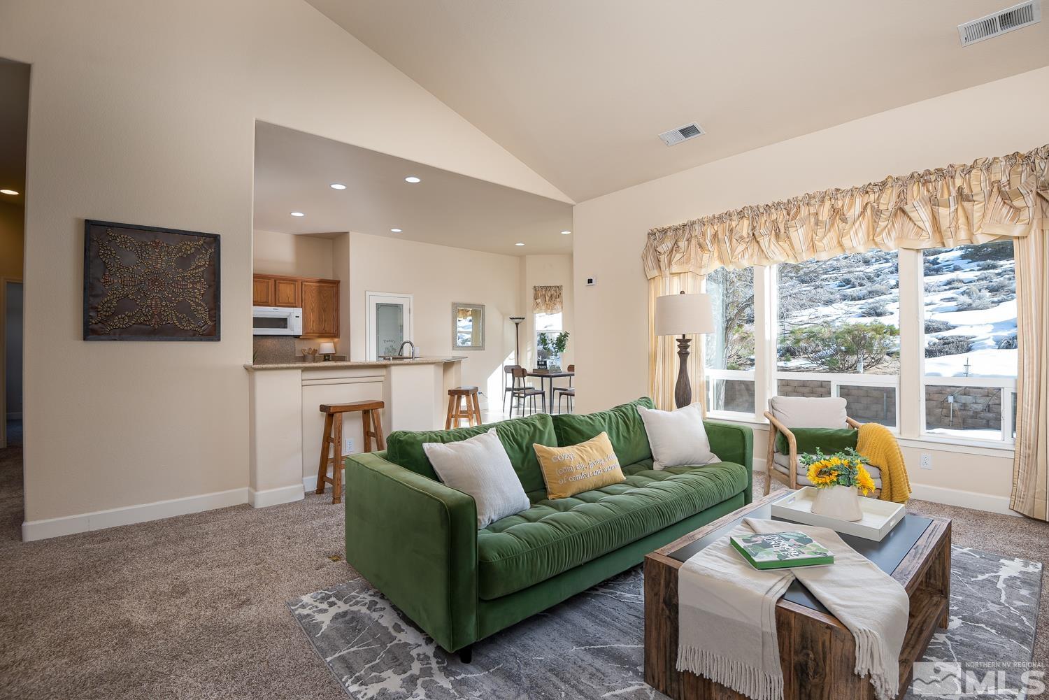 2647 Skyline Drive Minden, NV 89423 - Photo 7 of 39 a living room with furniture and a flat screen tv