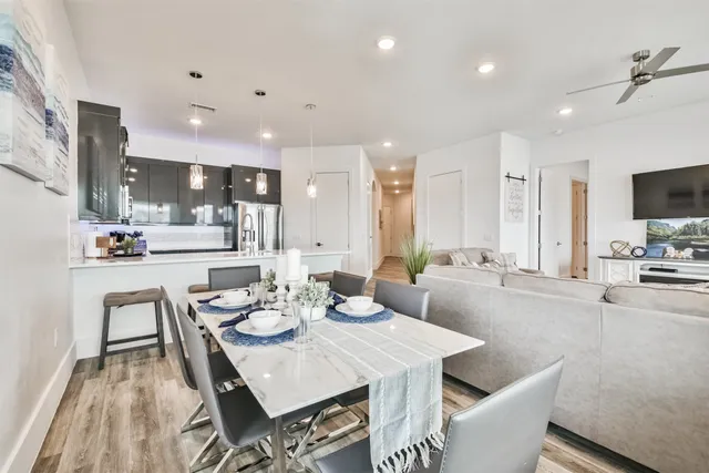 a view of a dining room with furniture window and outside view