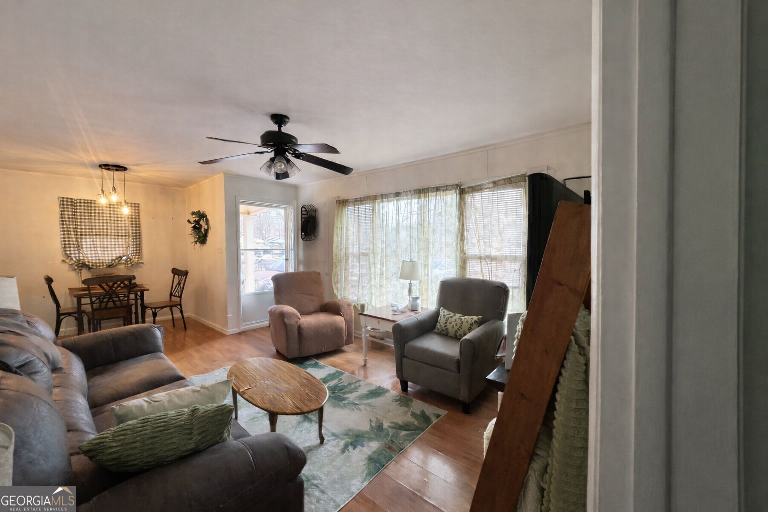 1 Lindsey Terrace Rome, GA 30165 - Photo 2 of 5 a living room with furniture and a large window