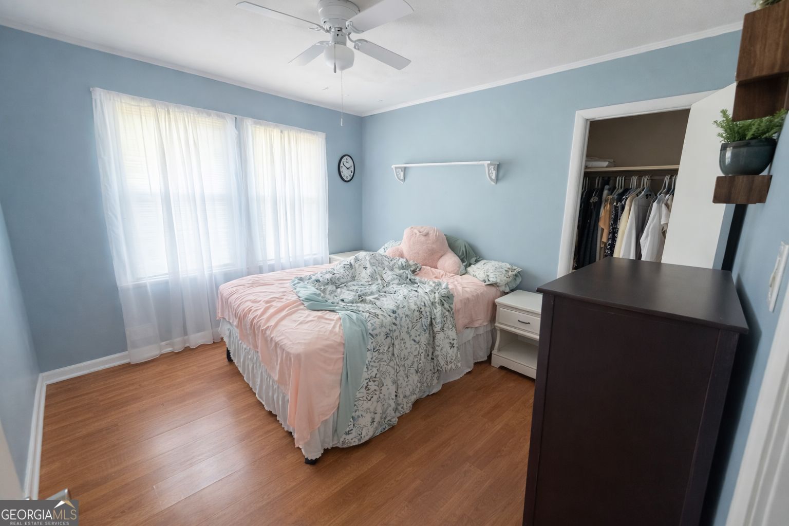 1 Lindsey Terrace Rome, GA 30165 - Photo 3 of 5 a bedroom with a bed and a bookshelf