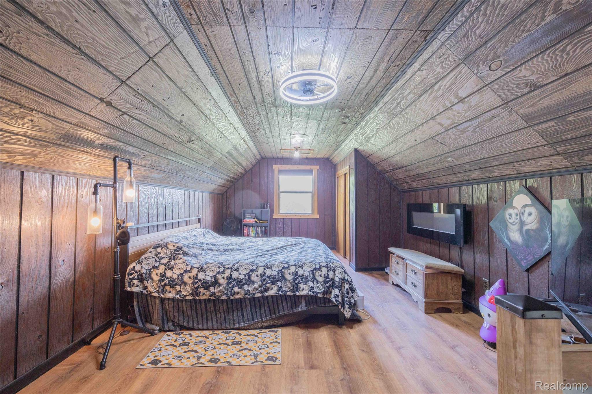 9160 Steffas Road Maybee, MI 48159 - Photo 21 of 36 Wood-finish flooring with wood-paneled walls and ceiling