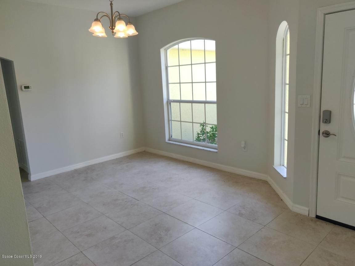 2025 Benjamin Road Grant Valkaria, FL 32950 - Photo 22 of 40 a view of an empty room with a window
