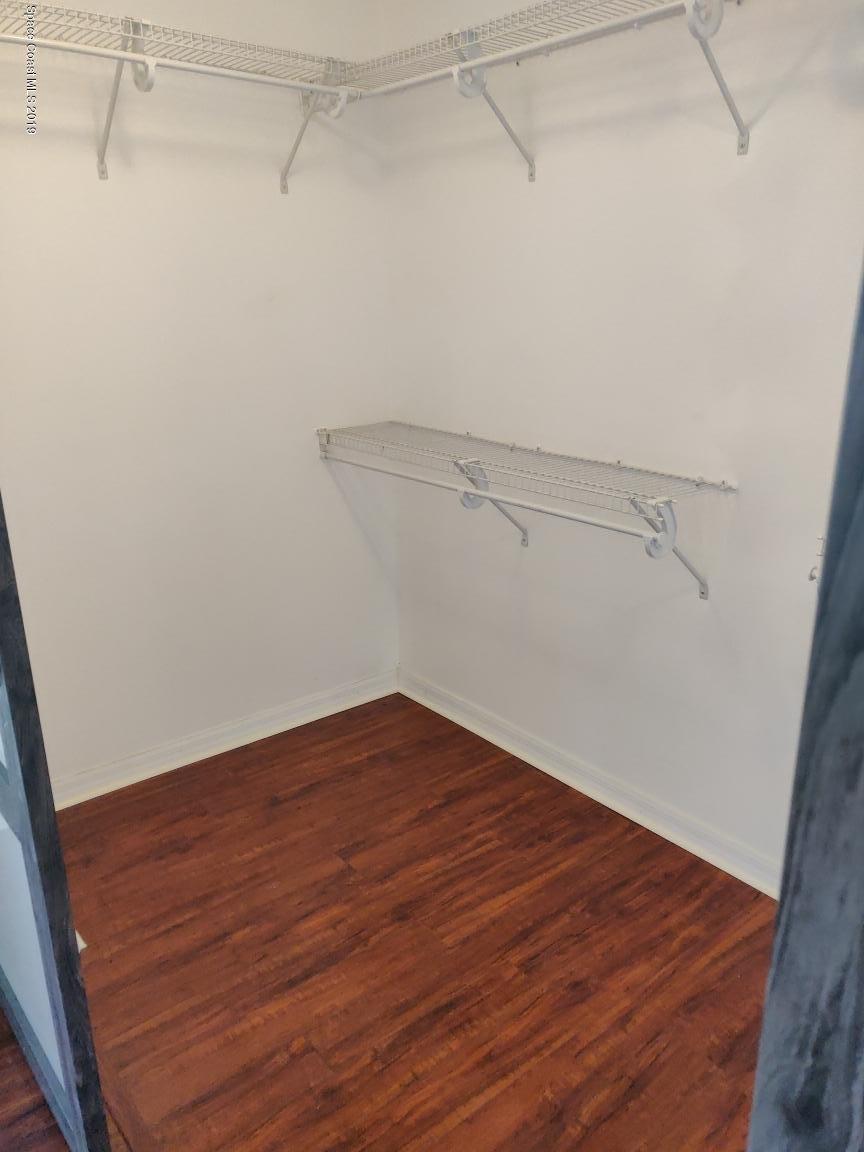 2025 Benjamin Road Grant Valkaria, FL 32950 - Photo 28 of 40 a view of a room with wooden floor