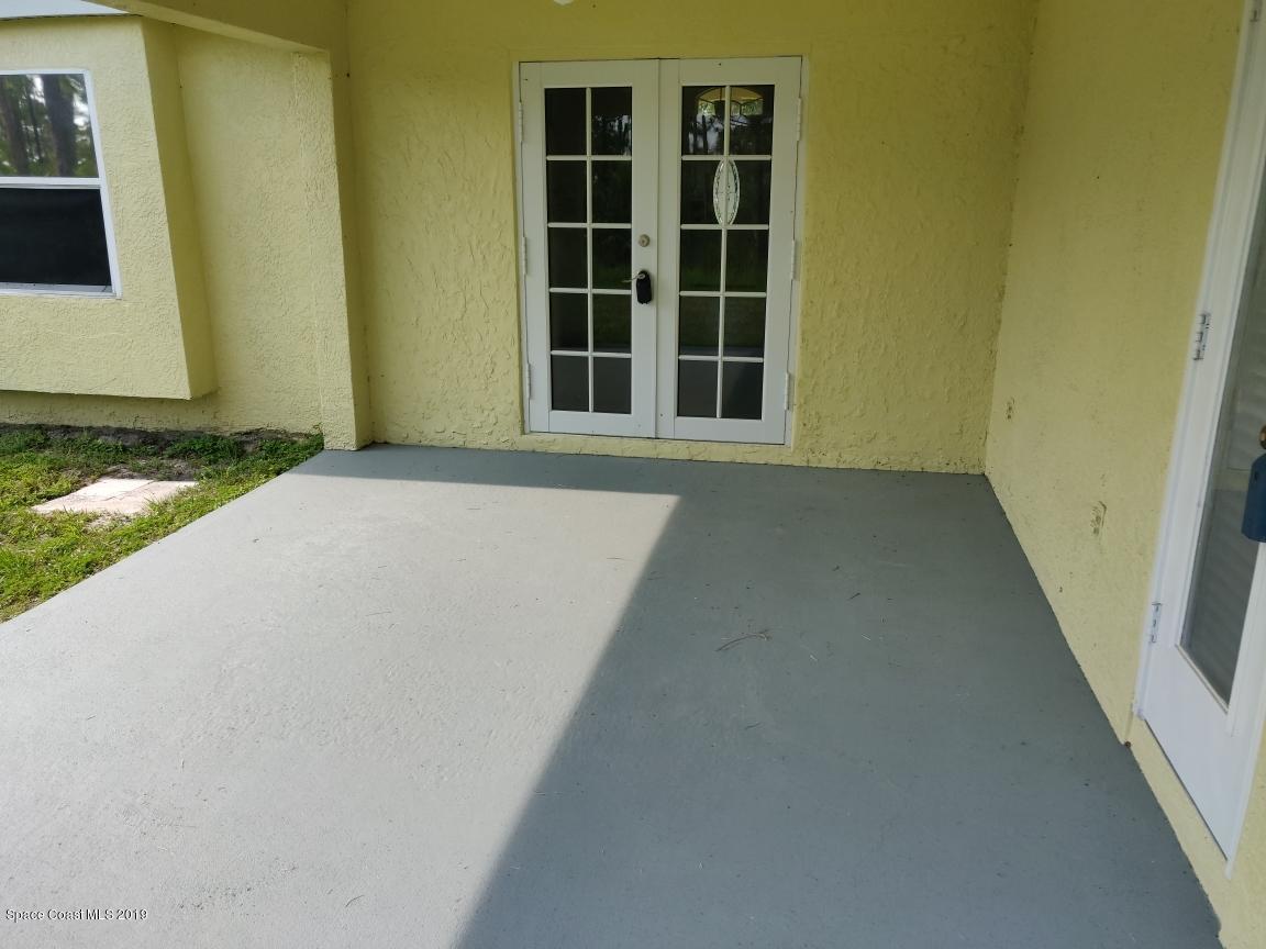 2025 Benjamin Road Grant Valkaria, FL 32950 - Photo 8 of 40 a view of front door