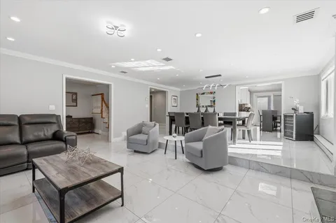 a living room with furniture and a table