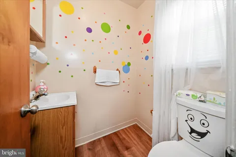a bedroom with a bed and dresser