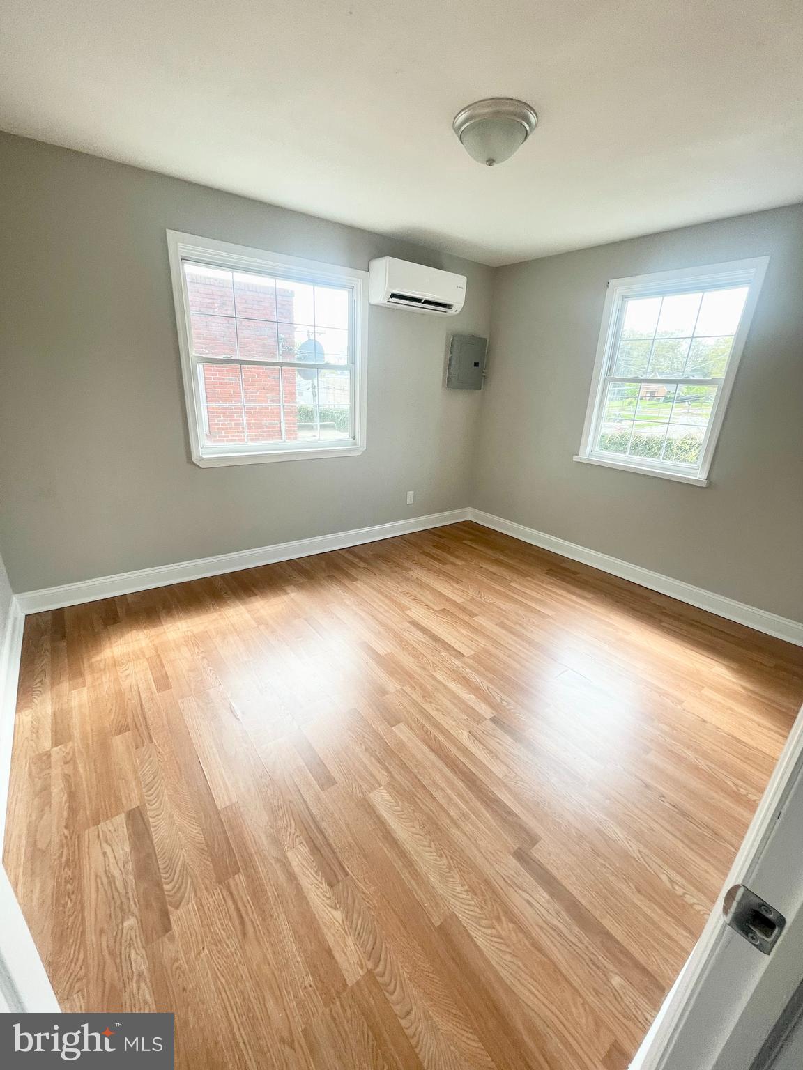 8528 Chestnut Oak Road, Unit B Baltimore, MD 21234 - Photo 11 of 15 a view of an empty room and a window