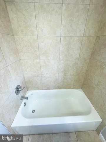 a bathroom with a bathtub