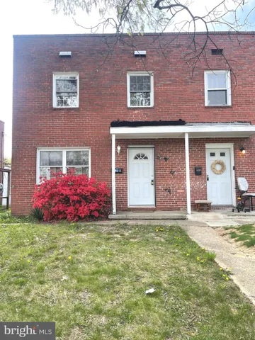 a front view of house with yard