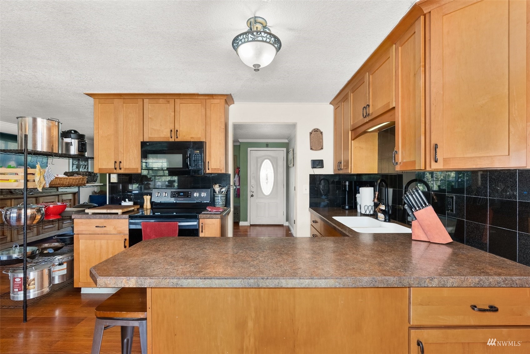 175 Ceres Hill Road Chehalis, WA 98532 - Photo 16 of 36 a kitchen with stainless steel appliances granite countertop a sink counter space and cabinets