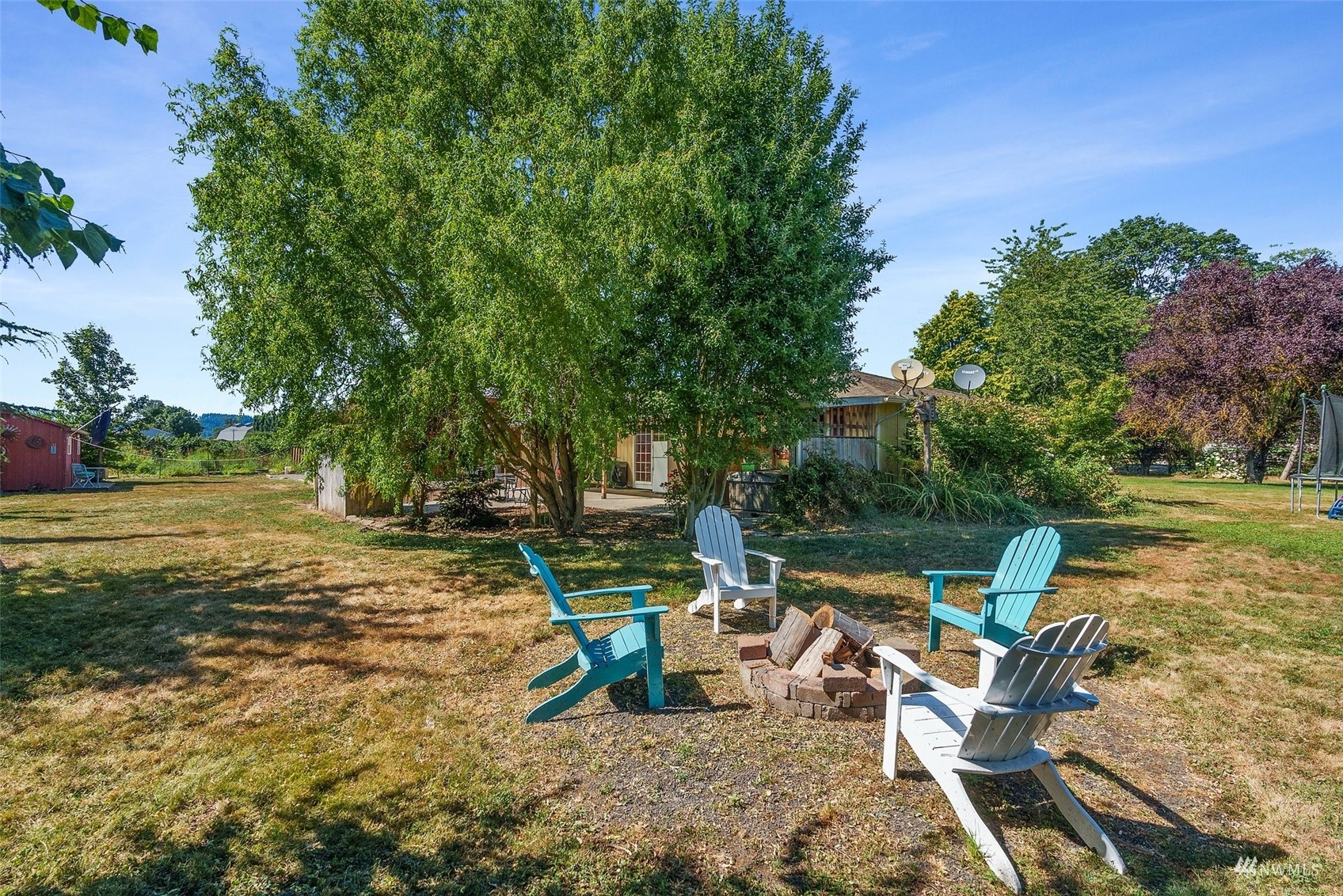 175 Ceres Hill Road Chehalis, WA 98532 - Photo 34 of 36 a view of a lake with a table and chairs