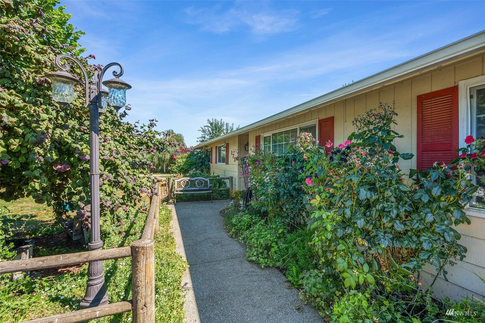 175 Ceres Hill Road Chehalis, WA 98532 - Photo 5 of 36 a front view of a house with a yard and fountain in middle