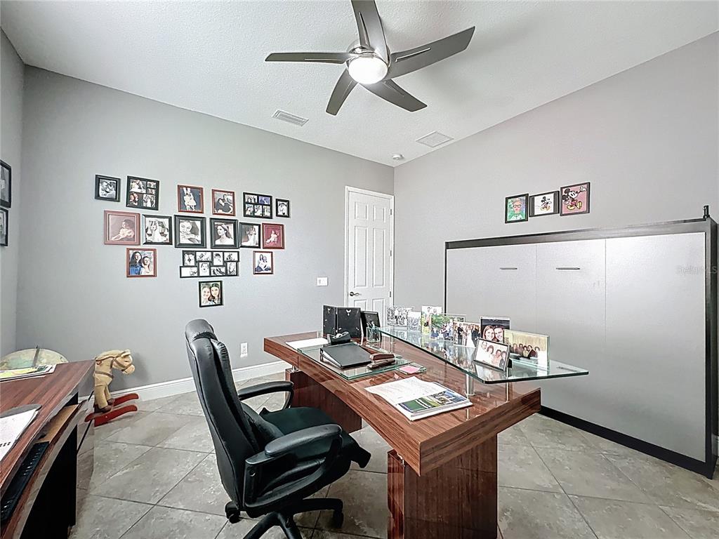107 Balmy Coast Road Groveland, FL 34736 - Photo 56 of 97 a view of a workspace with furniture