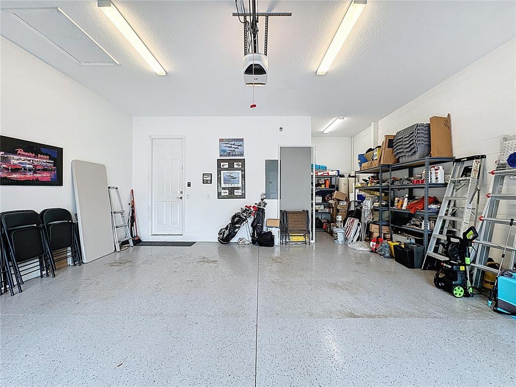 107 Balmy Coast Road Groveland, FL 34736 - Photo 62 of 97 a view of a room with gym equipment