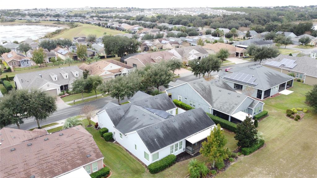 107 Balmy Coast Road Groveland, FL 34736 - Photo 72 of 97 an aerial view of a house with a lake view
